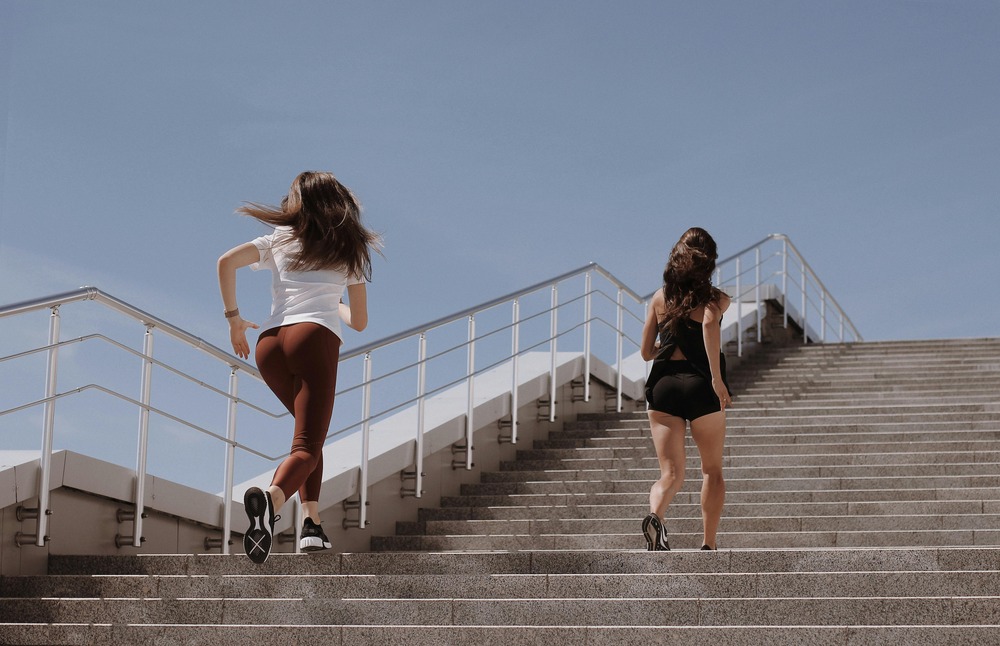 two ladies running